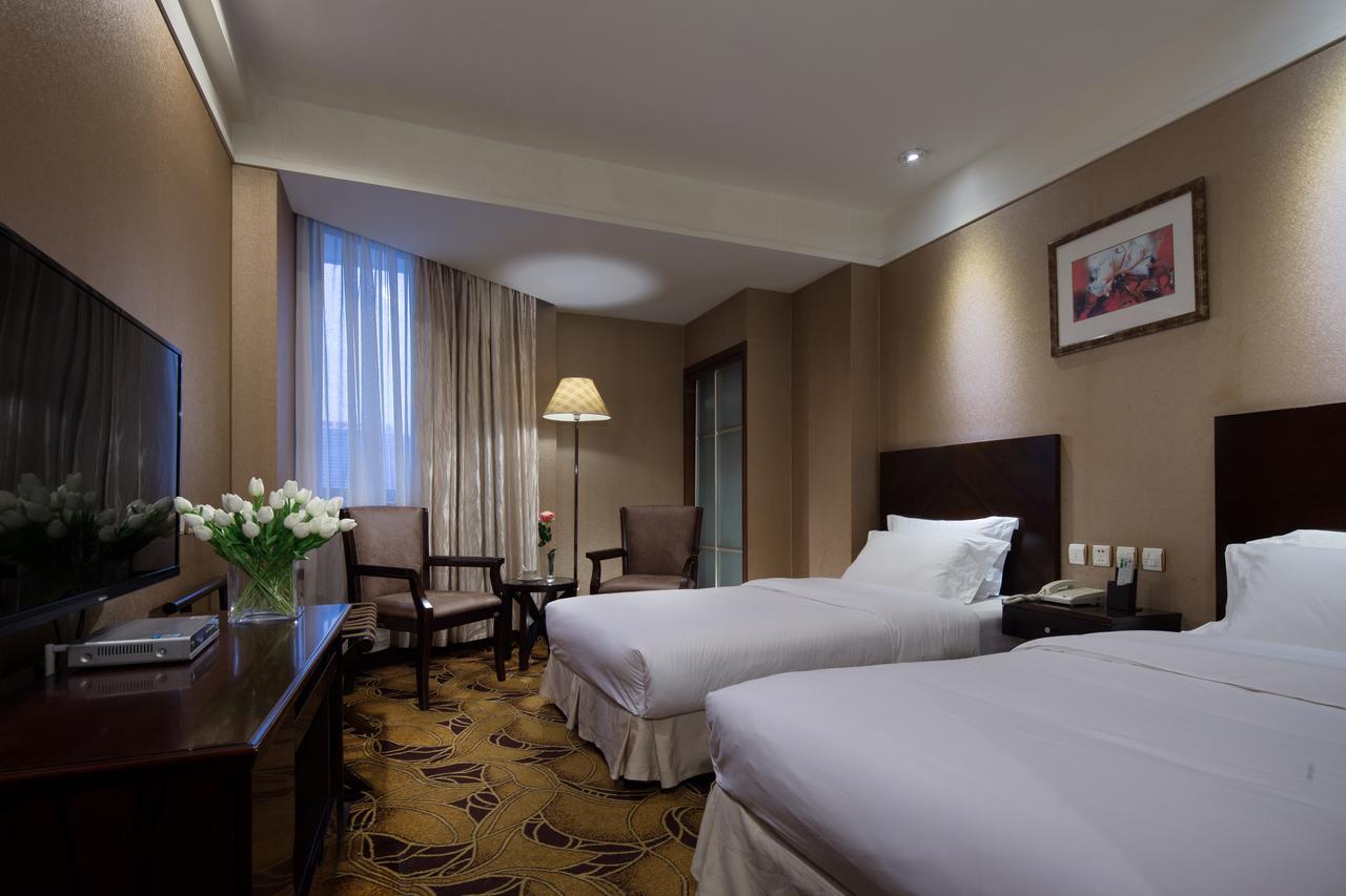 Wanxing Hotel Chao Yang Square Branch Наньнін Екстер'єр фото