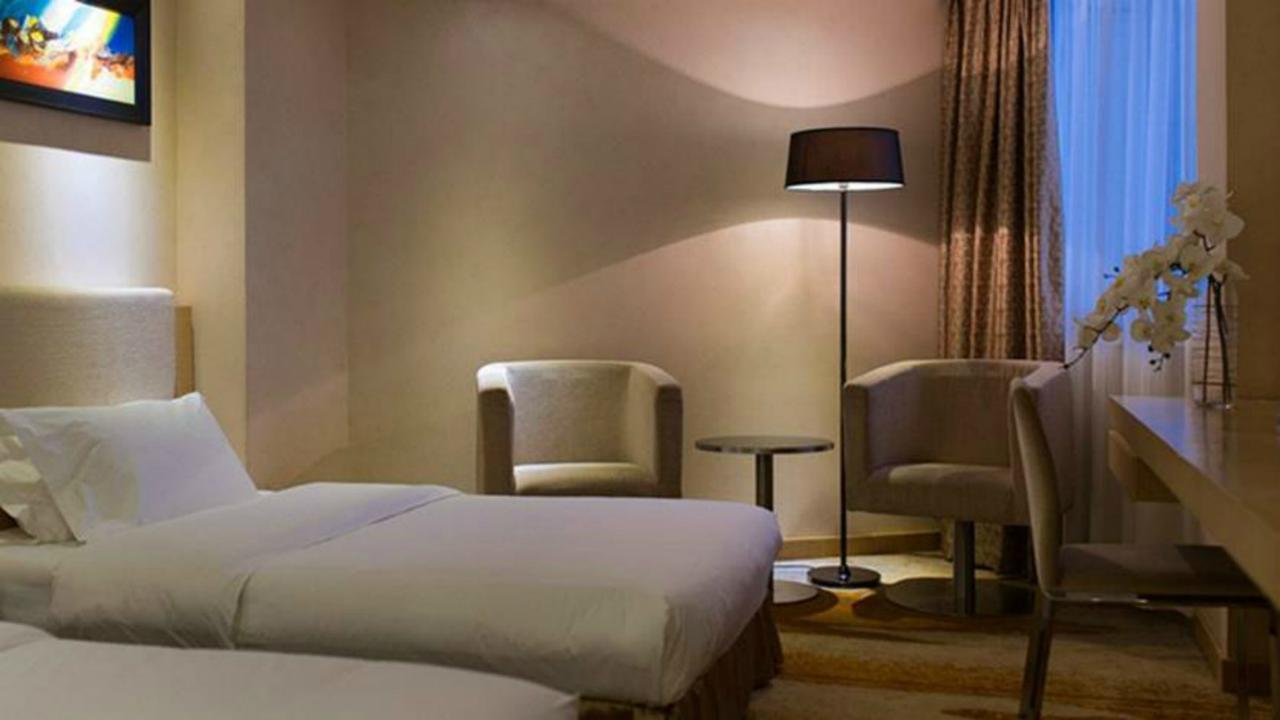 Wanxing Hotel Chao Yang Square Branch Наньнін Екстер'єр фото