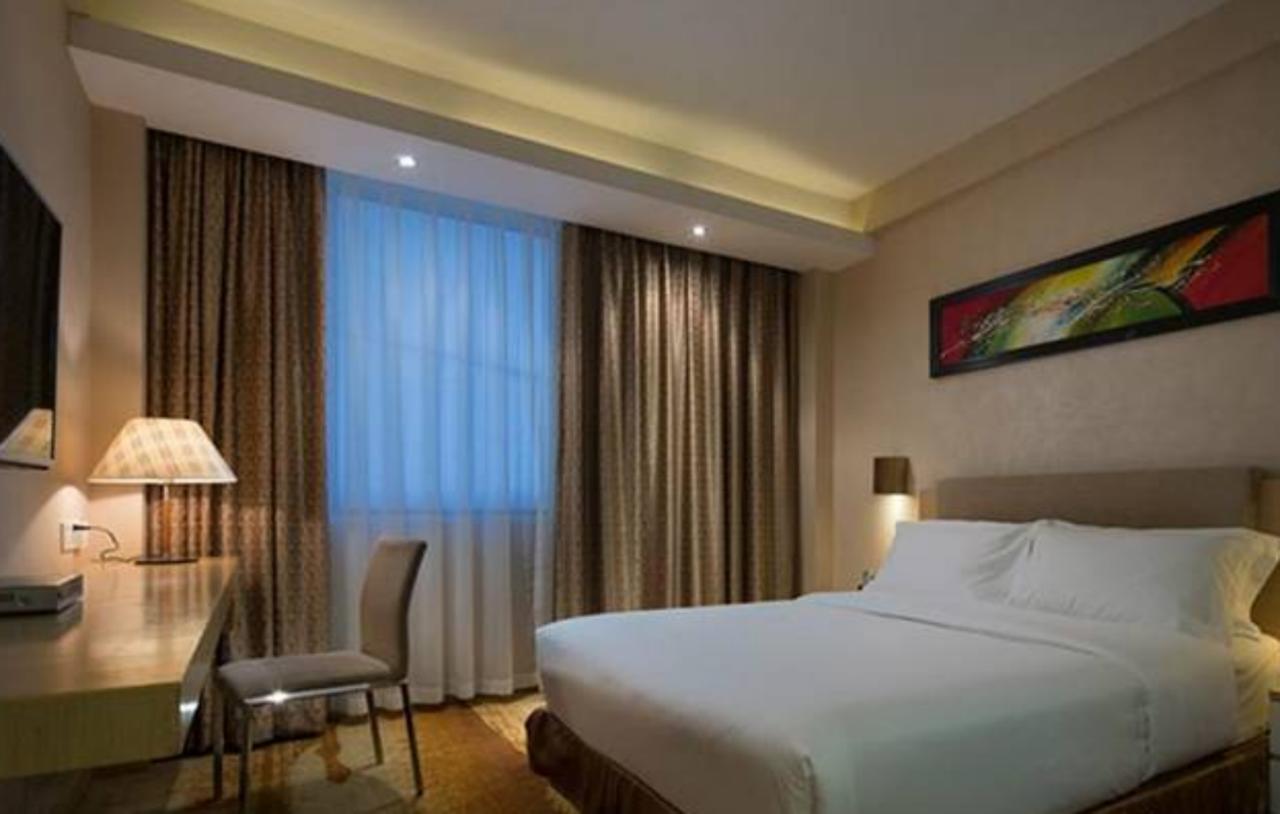 Wanxing Hotel Chao Yang Square Branch Наньнін Екстер'єр фото
